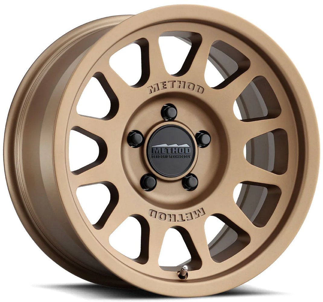 17x9 Method Race MR703 Bronze (Bead Grip) 5x5.5/139.7 -12mm
