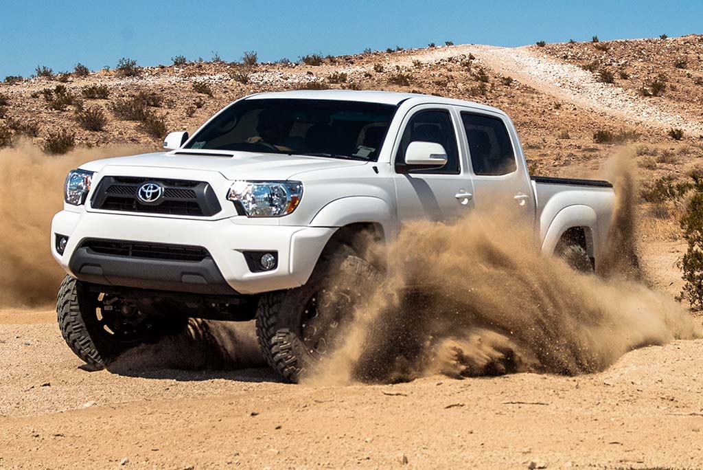 ICON 2005-2023 Toyota Tacoma, 2.5 VS Extended Travel, Remote Reservoir w/ CDEV Coilover Kit, 700 lbs/in Coils 58735E-700