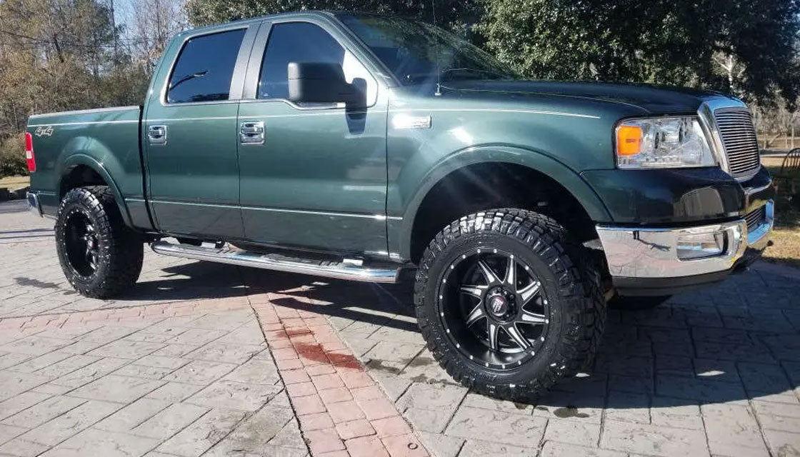 (Clearance - No Returns) 24x14 American Truxx AT162 Vortex Gloss Black Milled (* May Require Trimming) 8x6.5/165 -76mm - Flex Offroad